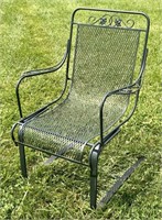 Wrought iron spring chair.