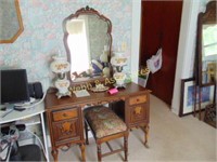 Mirrored dressing table, upholstered bench, and