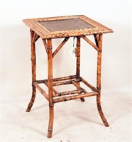 ANTIQUE ENGLISH BURNT BAMBOO GAME TABLE