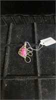 Hand wrapped sterling silver two tone pink stone
