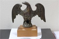 A Bronze Eagle on Wood Stand