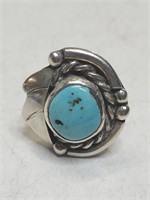Silver and turquoise Southwest style ring.