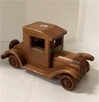 Handcrafted wooden rolling anti-car replica