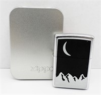 2000 SEALED CRESCENT MOON OVER MOUNTAINS ZIPPO