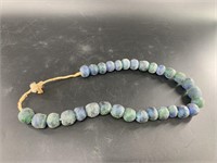 22" Strand of blue sand cast beads