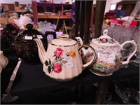 Three vintage teapots: two Sadler, one scenic and