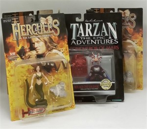 (J) Tarzan and Hercules action figures.