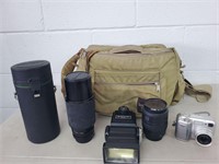 Nikon camer and miscellaneous lenses in bag