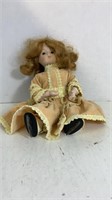 Porcelain Doll in Tan Dress & Hat & Ice Skates