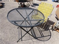 Metal folding patio table & chair.