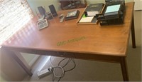 One drawer work desk with the contents in the