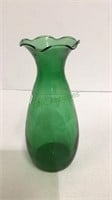 Emerald green glass ruffled lip vase measuring