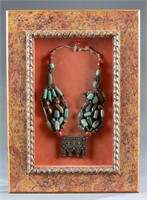 Framed Berber Hirz necklace.