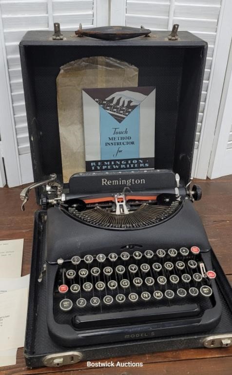 Model 5 Remington typewriter with original book