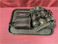 Two Pairs Of Binoculars- 1 Is Tasco, Both Have