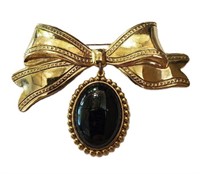 VINTAGE GERVAIS GOLD AND BLACK OVAL BOW BROOCH