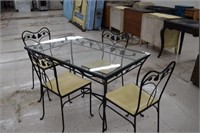 Wrought Iron Patio Table w/4 Chairs(crack in glass