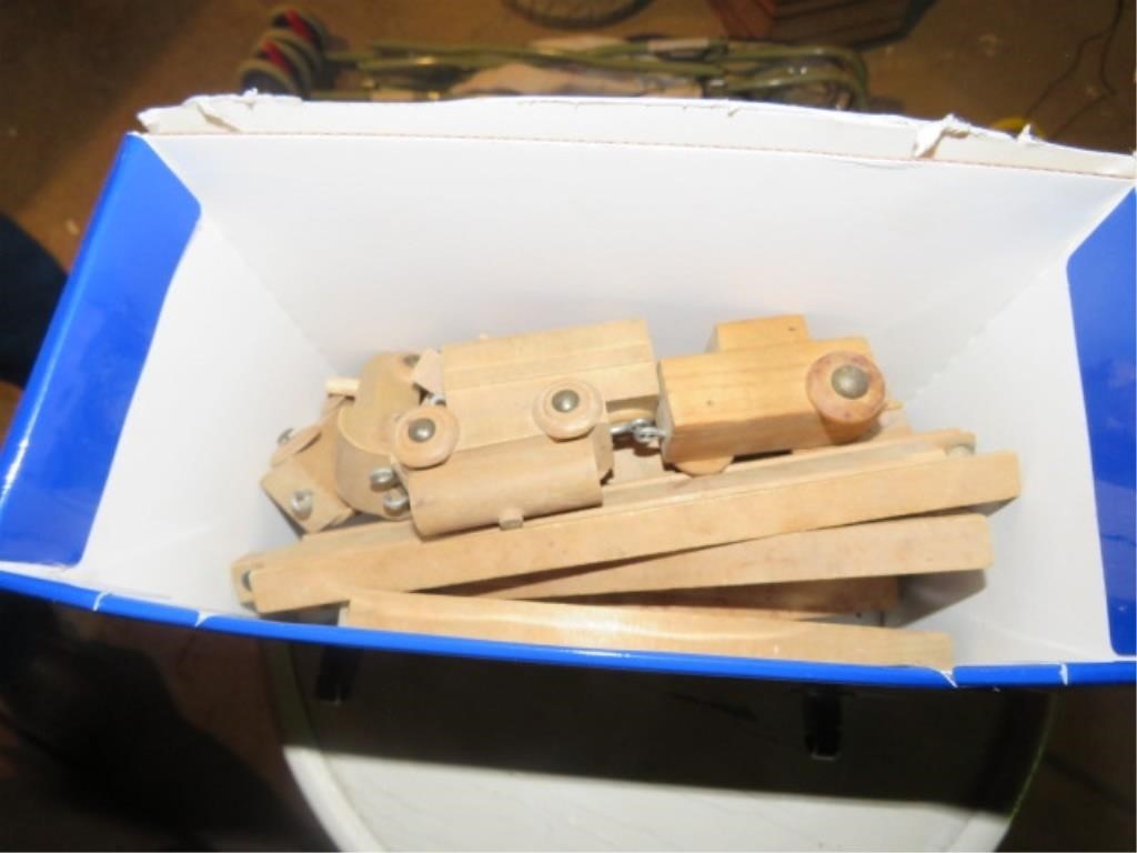 SMALL BOX OF WOOD TRAIN PIECES