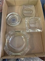 Flat of glass ashtrays