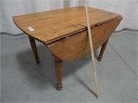 Antique drop leaf table; top is 43"x27" not incl