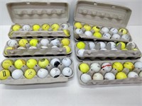 box of golf balls in egg cartons