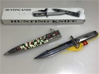 NIB Fixed blade hunting knife.