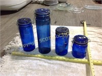 4 blue glass bail lid canisters, new in box