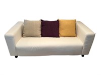 An IKEA Cream Upholstered Sofa