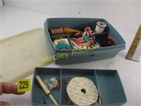 SEWING ITEMS IN TUPPERWARE DISH