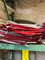 Stack of red/white 7’x20’ walls