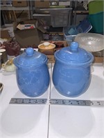 lot of two blue canisters
