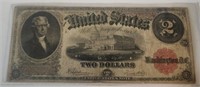 $2 Large U.S. Note 1917 red seal – very good.