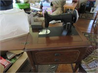 Vintage Kenmore sewing machine in stand