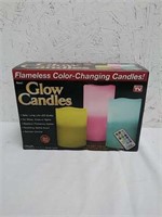 New in box flameless color changing glow candles