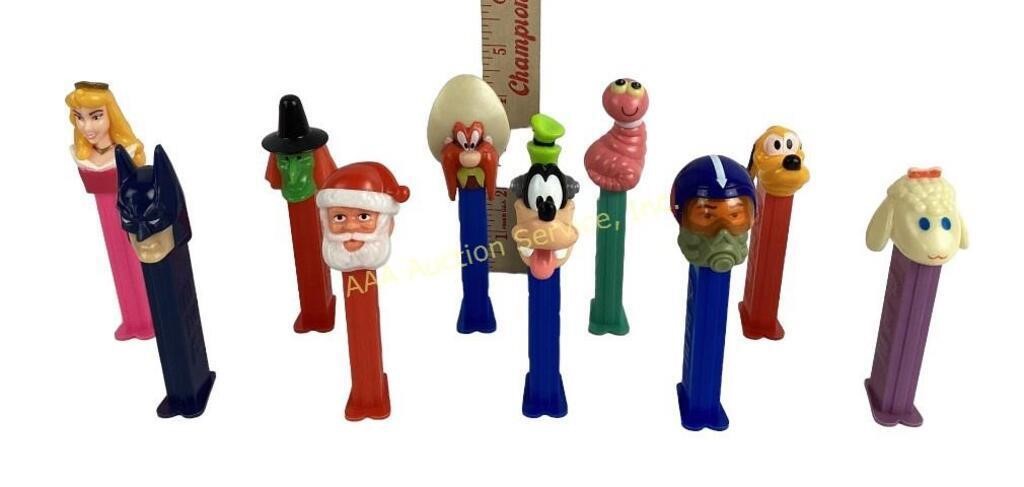 Pez dispensers. Yosemite’s Sam,lamb, Pluto,