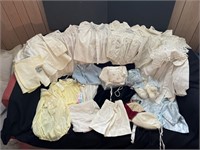 Box of vintage baby clothes