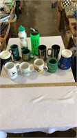 John deer assorted coffee mugs cups.