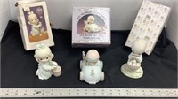 Precious Moments collectibles with boxes