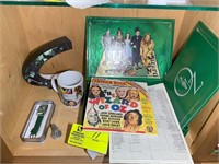 SHELF WITH WIZARD OF OZ THEMED ITEMS INCLUDING WAT