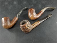 A Collection of several old tobacco pipes, used