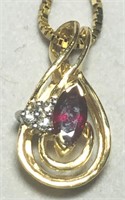 14KT YELLOW GOLD RUBY & DIAMOND PENDANT WITH