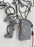 Sony PlayStation w/ Controllers (powers on)