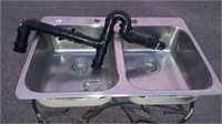 Double Kitchen sink with some Hardware