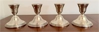 Four Vintage Weighted Sterling Candle Holders