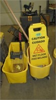(2) Mop Buckets w/Mop & Caution Sign