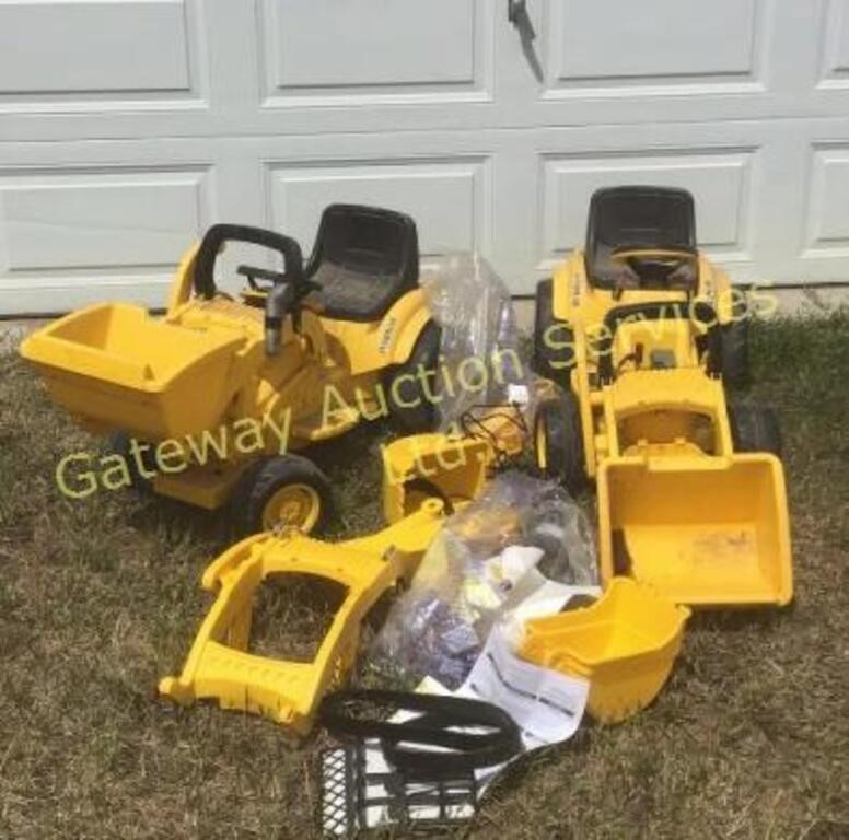 Two caterpillar battery operated tractors