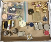Collection of vintage compacts, perfumes,