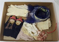 Flat of vintage ladies gloves and hat