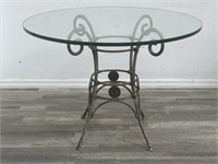 Vintage French-style metal table with glass top