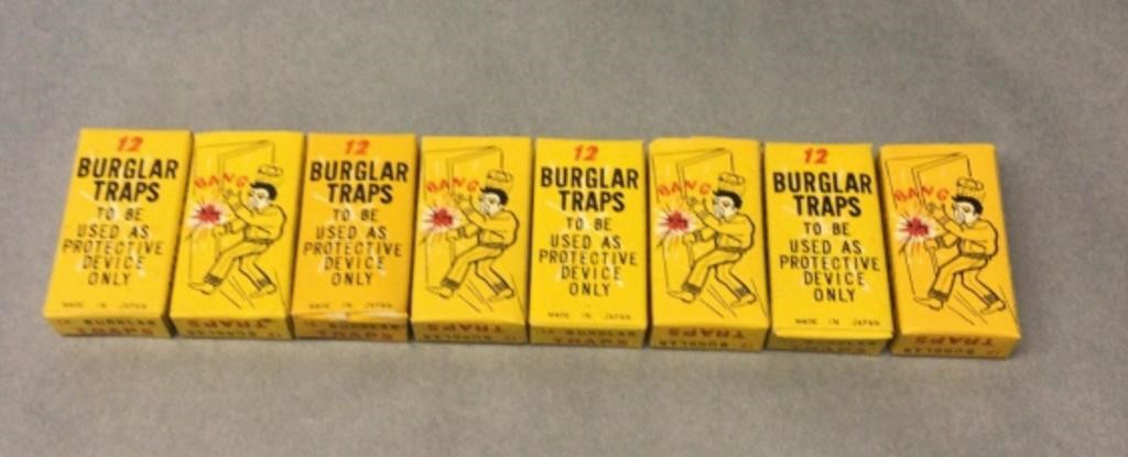 8 boxes of burglar traps ( string fire crackers )